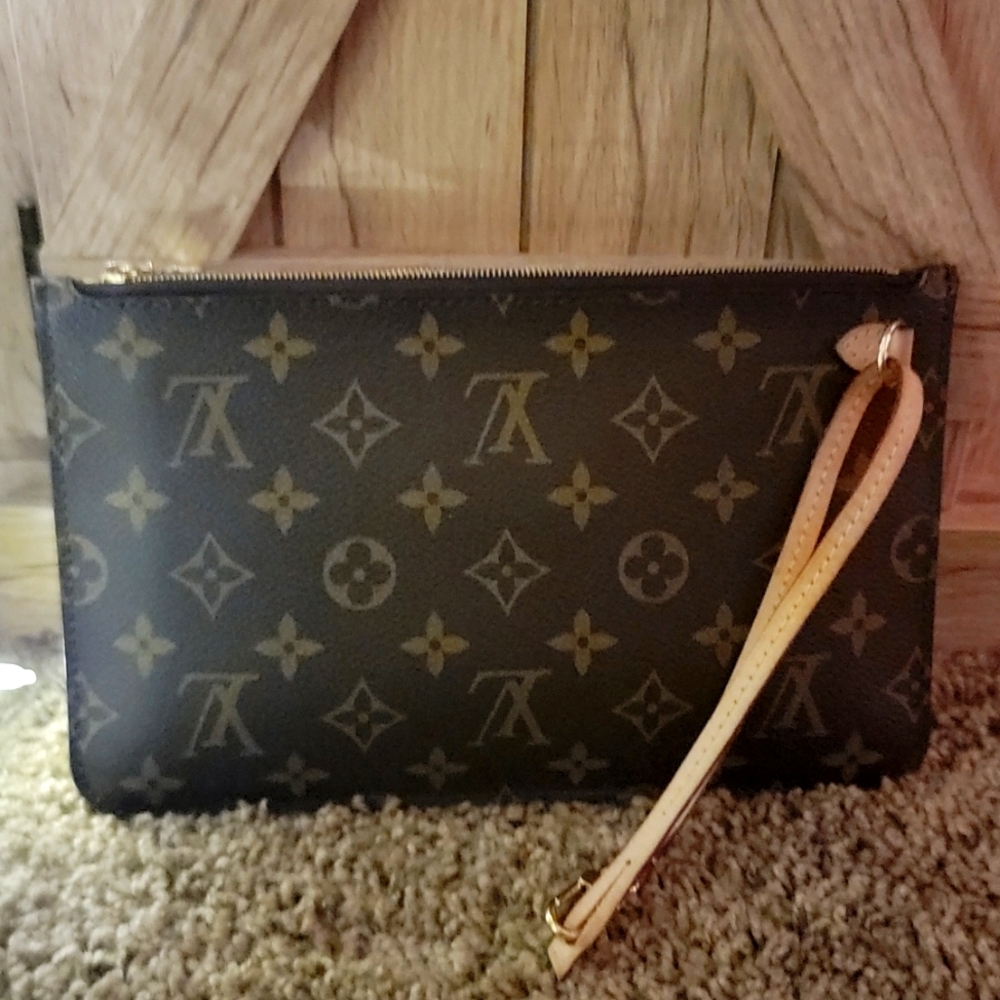 Authentic Neverfull Wristlet